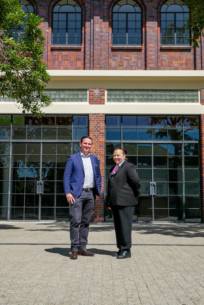 Simon and Zena standing outside the RNA looking at the camera