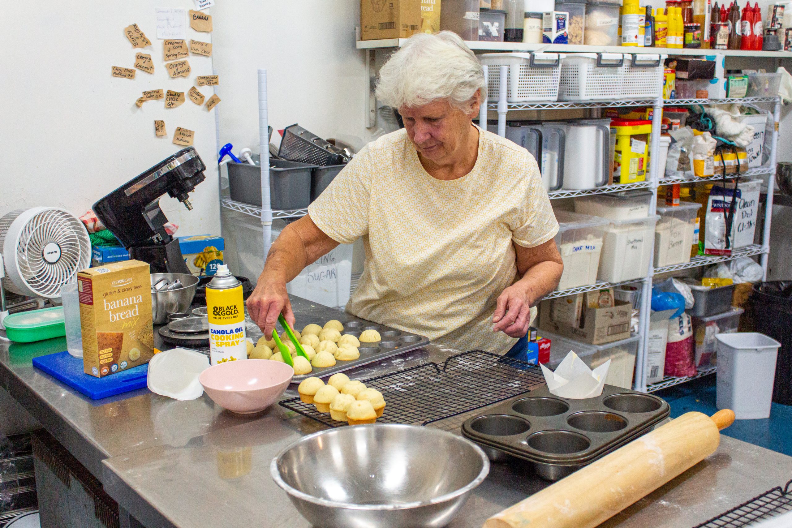 Gwenda working on decorating some delicious muffins.