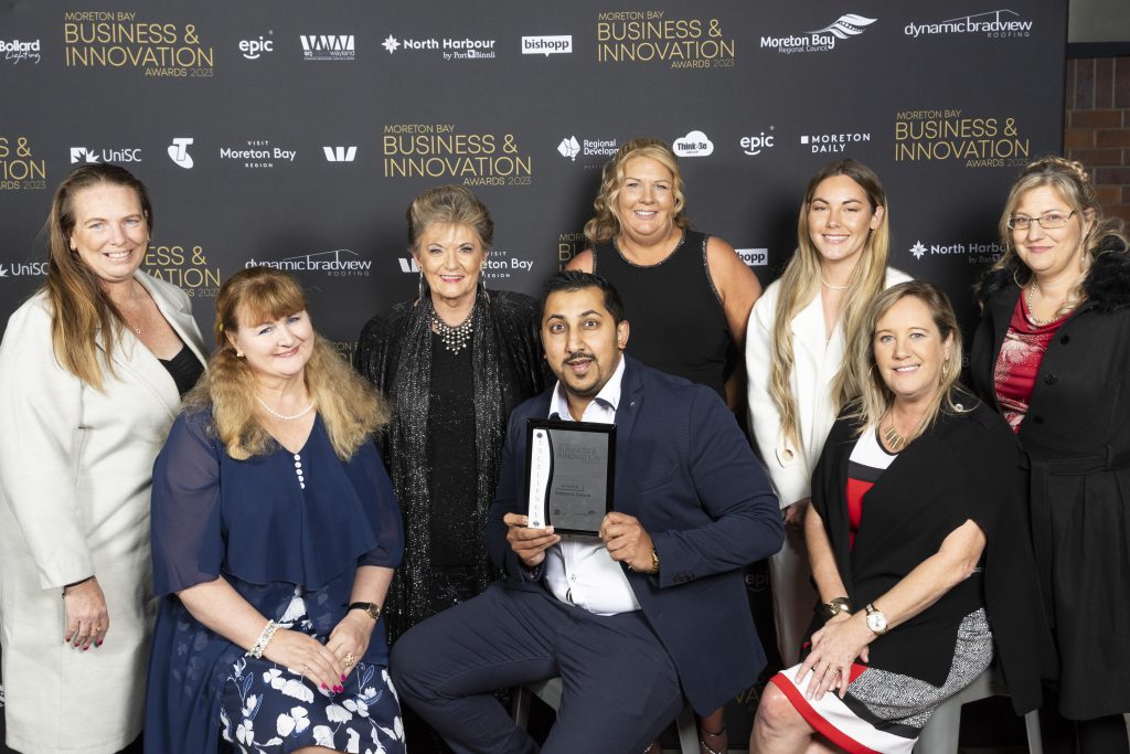 Winners Belgravia Leisure pose with EPIC's Jill Nash on the MBRIT awards red carpet