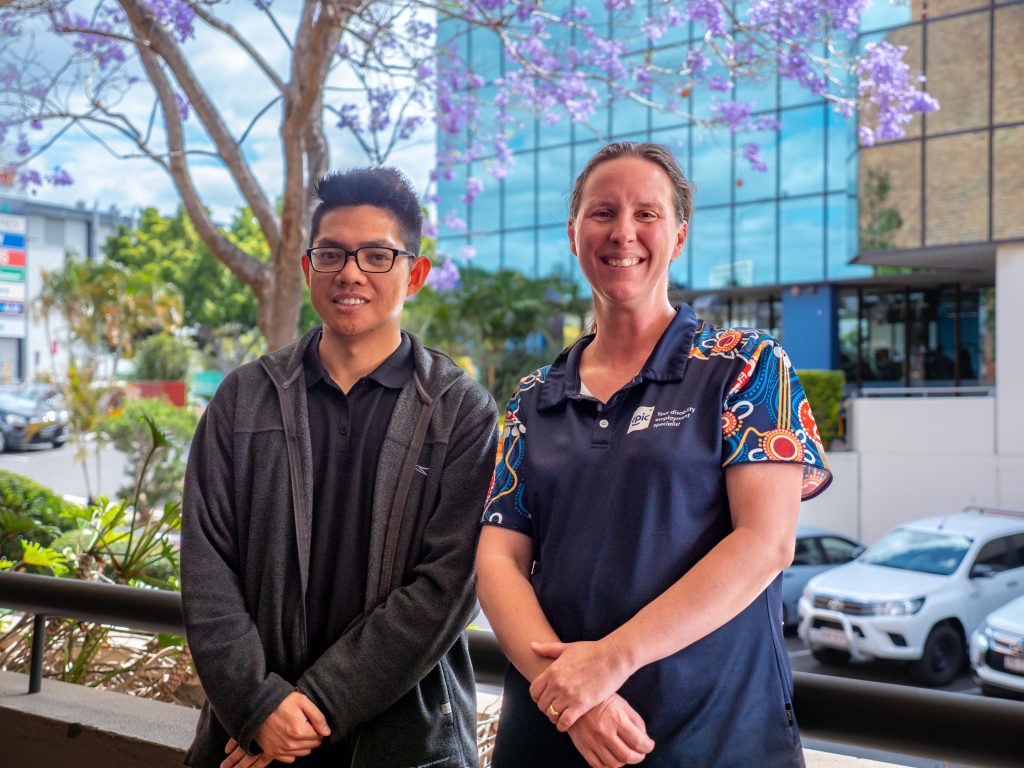 Justin standing with Jess Scott from our South Brisbane offices.