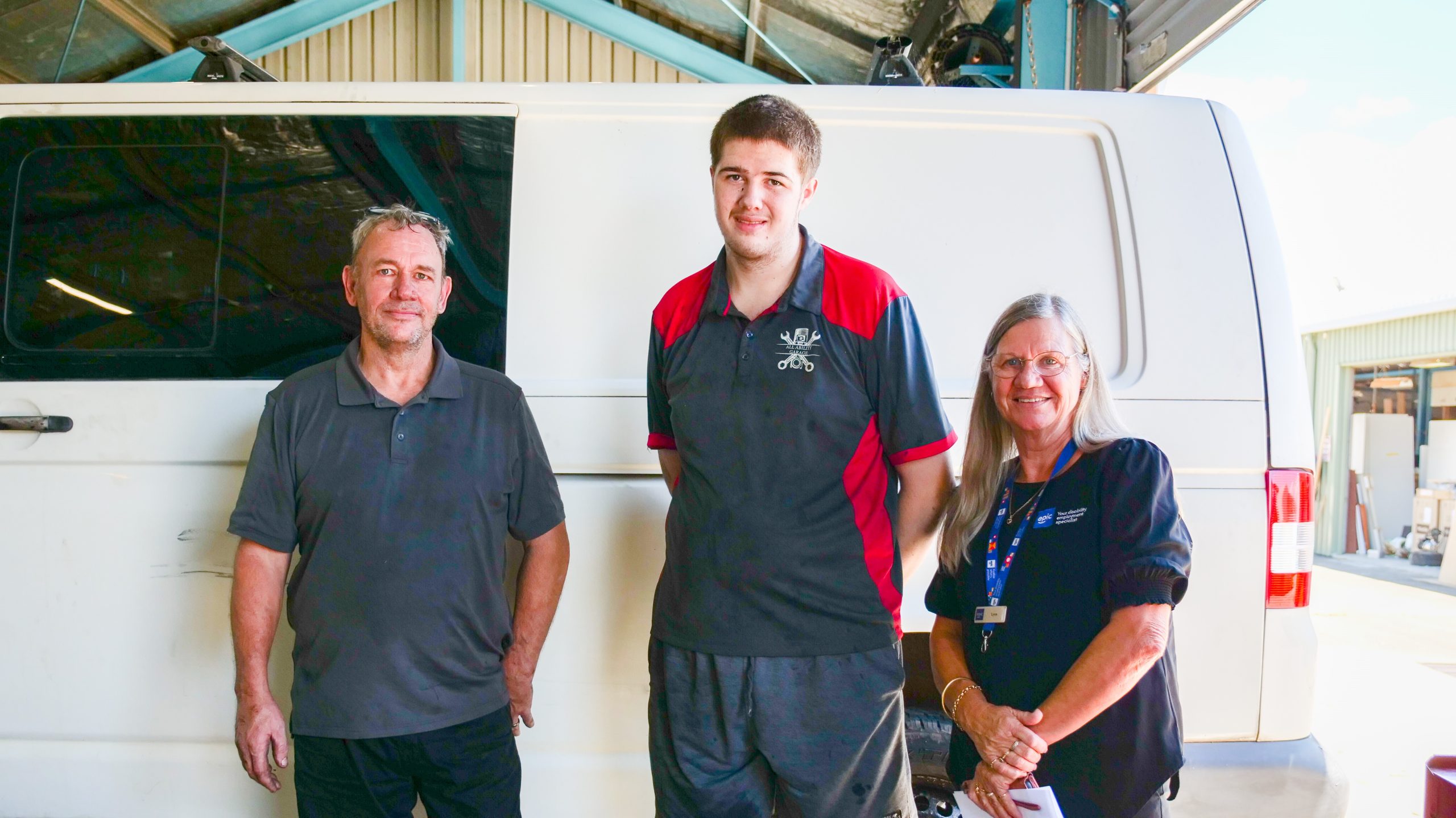 Thomas and Cameron standing out front of their newest project with EPIC Consultant Lynn Barben