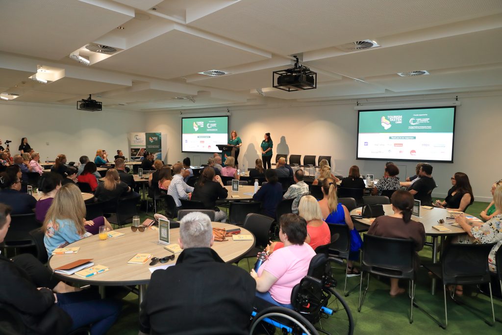Trudy Nagle and Jill Nash presenting at a Tourism Taster Event in Cairns for Small and Medium Tourism Enterprises.